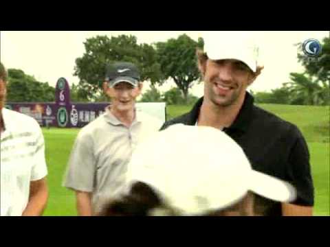 Phelps learns to play golf