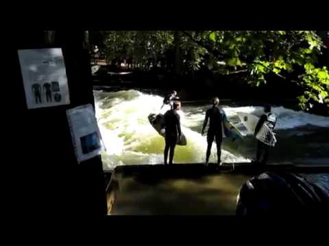 Surfing a river during winter floods.avi