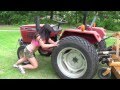 Almost 50 year old Farm Girl Pulls Tractor and pushes ...