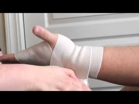 Applying a Figure 8 Elastic Bandage to an Injured Wrist