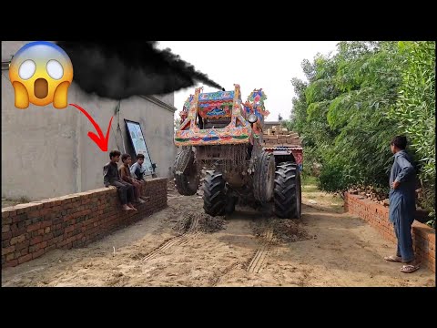 MF 265 Tractor stock in mood with heavy loaded trolley