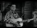 Merle Travis performs Nine Pound Hammer and Mus'rat.