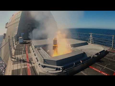 Littoral Combat Ship 🇺🇸USS Montgomery fires Longbow Hellfire missiles against a land target.