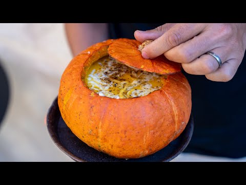 Creamy butternut squash soup served in the pumpkin