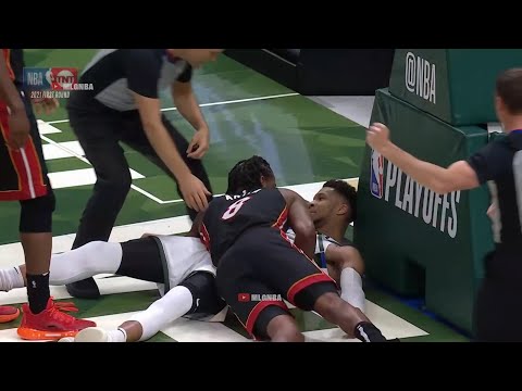 Trevor Ariza tackles Giannis then pushes off his chest on the ground💀