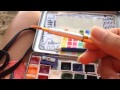 Travel watercolor kit and sketchbook 