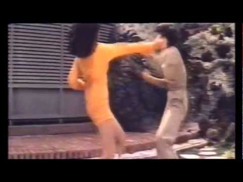 Cleopatra Wong (Marrie Lee) knocks out her female opponent