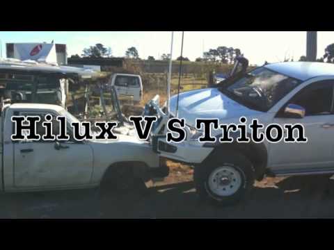 CUSTOM MITSUBISHI TRITON L200 PARKED ON A HILUX