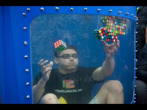World Record! 8 Rubik's Cubes Solved Underwater Video
