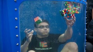 Guinness World Record! 8 Rubik's Cubes Solved Underwater