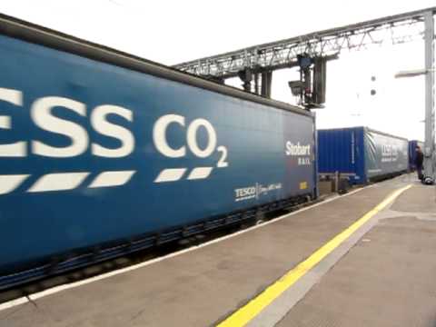 92017 passes Carlisle working the 'Tesco Express' 12/04/2011