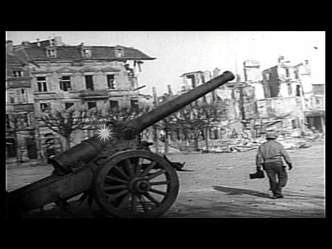 Wreckage of buildings, empty roads and soldiers in Saarlautern, Germany. HD Stock Footage