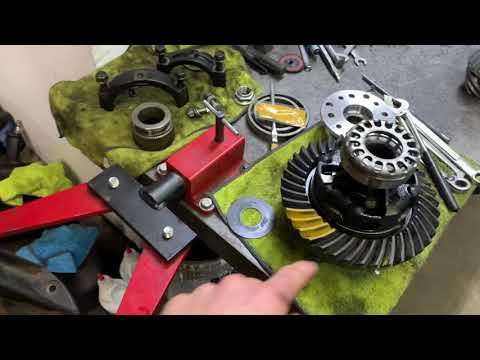 Toyota rear differential 3rd member solid pinion spacer and pinion depth adjustment.