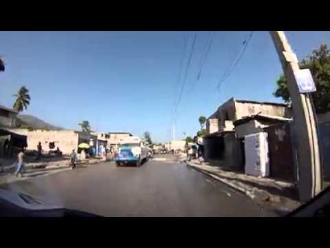 United Nations Police Officers on daily commute through yellow security zone in Haiti that includes Cite Soleil and Martissant