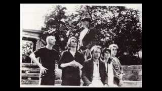 legendary pink dots - love on a pale green postage stamp