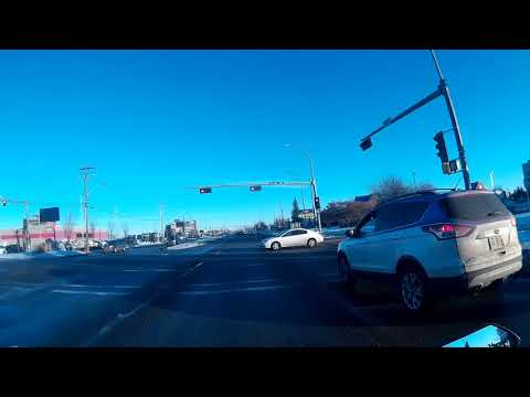 DUMB KAREN IN HER FORD CUTS OFF A BIKER PLATE # BLC-2179