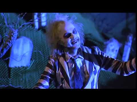 1988 Beetlejuice theatrical trailer frame: green title card with warped typography over black