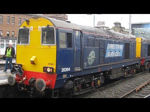 UK: DRS Class 20s 20304 & 20301 leave Carlisle station with The Cumbrian Crusader II Railtour ECS