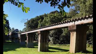 Queensland Rail NGR unit 760 works over a bridge run DK62 arriving into Woombye station on Mon Apr 7