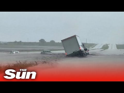 Flash floods completely submerge Texas highway