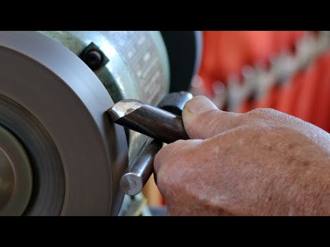 Richard Raffan shapes and sharpens a bowl gouge