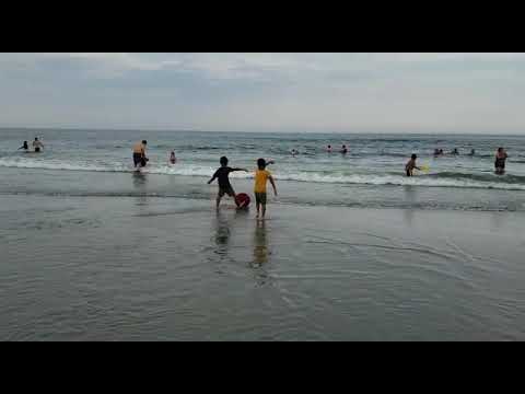 Amay and chikku playing on the beach on july 4th 2019
