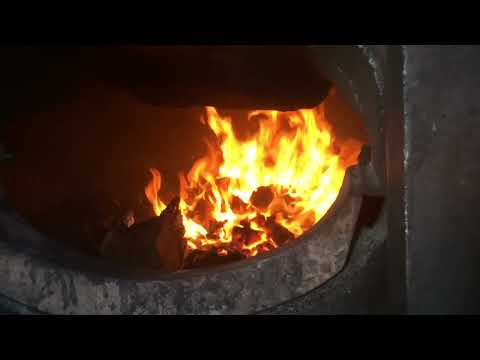 Lighting up a coal burning steam locomotive.