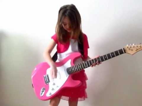 My daughter playing her first bass guitar