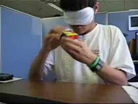 Chinese guy does the Rubik's cube BLIND FOLDED