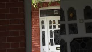 Album cover: Restored facade, tuck pointed as original