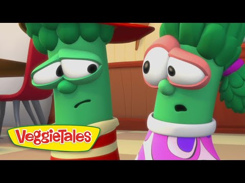 Two VeggieTales vegetables with worried expressions stand indoors; logo reads VeggieTales in the lower-left corner.