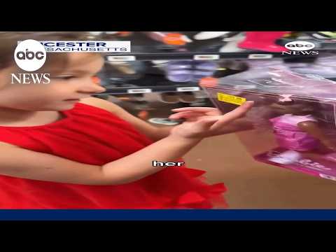 Excited girl finds Barbie doll that has hearing aid like her