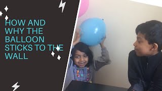 Why and how the balloon sticks to the wall?