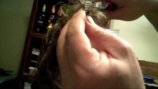 How to untangle your hair from a comb