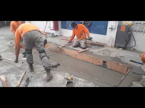 Veterans concrete,....cont. cement finish @ retrofited car lift pit