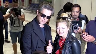 Louane and Benjamin Biolay arriving together at Cannes airport for the festival