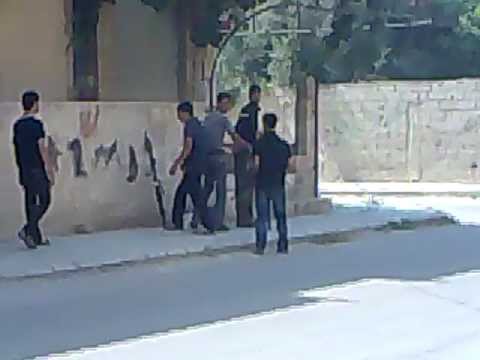 إشتباكات كتيبة عبدالله بن عمر مع قوات الأمن على حاجز مخفر المخيم في درعا