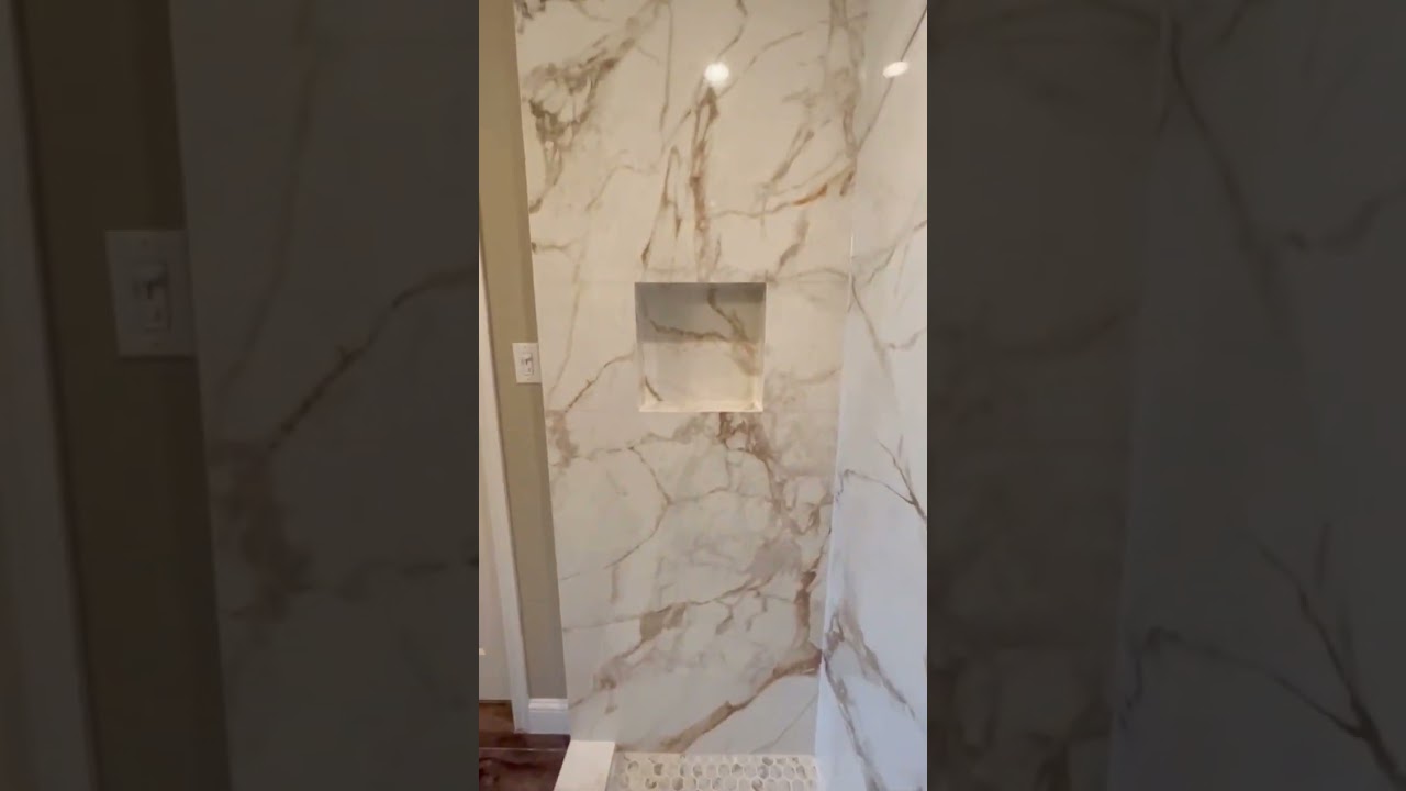 Large-Format Porcelain Shower #largeformatporcelain #porcelaintile #sinteredstone