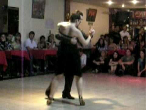  Fernando Sanchez  and  Ariadna Naveira  are  dancing  to  the  milonga  "  Ella Es Asi  "