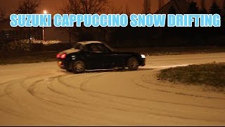 Midnight snow drifting in a Suzuki Cappuccino