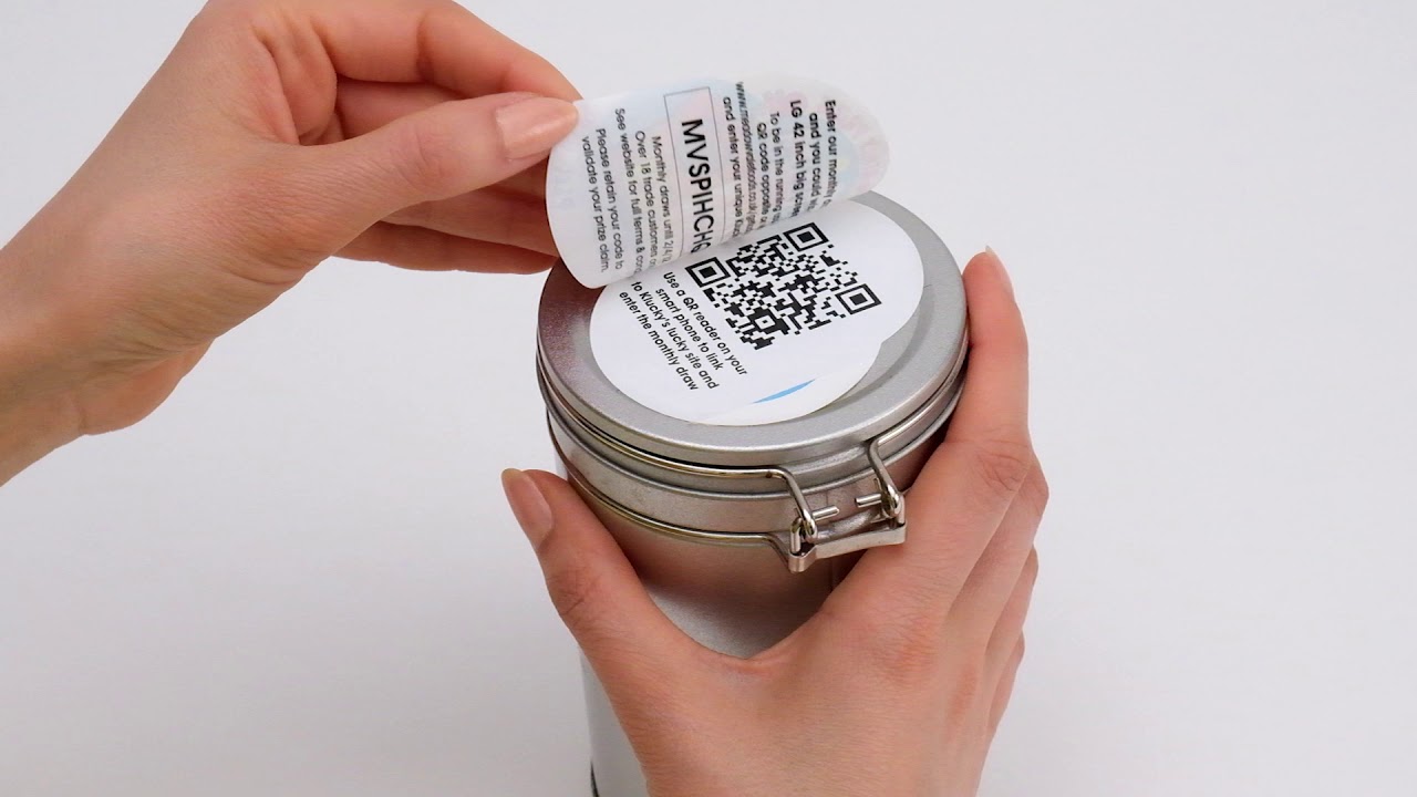 Peel and reveal label with unique code