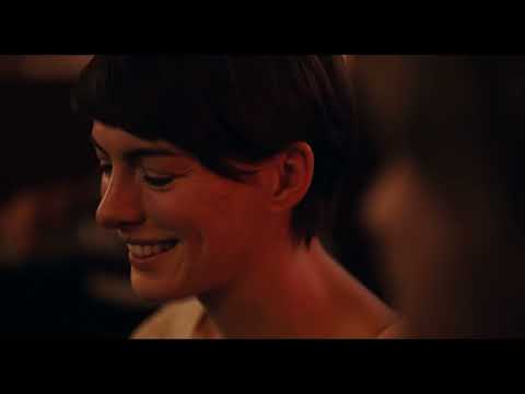 Song One (2015) official trailer frame: Franny (Anne Hathaway) watching James Forester (Johnny Flynn) onstage