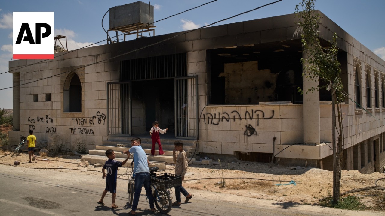Video: West Bank resident describes 3 AM mosque fire blamed on settlers