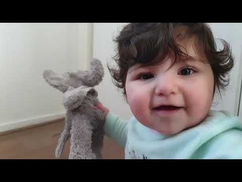 Cristabel with Riky, baby with dog playing, friends forever