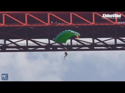 Foreign thrill seekers head to China for extreme sports on world's highest bridge