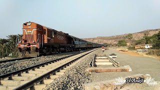 preview picture of video 'Jamalpur WDM 3A With Bhagalpur Garib Rath & Passenger Train Near Scenic Jamalpur Hills & Tunnel'