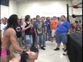 TYLER BLACK SETH ROLLINS Moonsaults Off A Fan Onto MATT SYDAL EVAN BOURNE