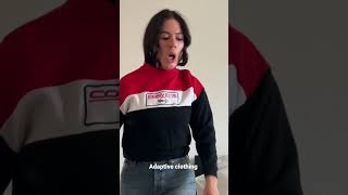 Putting on a sweater vs. an adaptive sweater