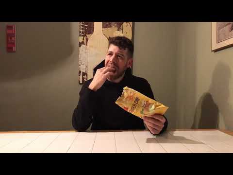 Honey Butter Chips iconic yellow bag being opened showing the golden seasoning-coated chips inside