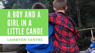 A Boy and A Girl in a Little Canoe